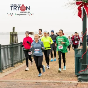 Runners on the Trail to Tryon Holiday Half course along the New Bern waterfront